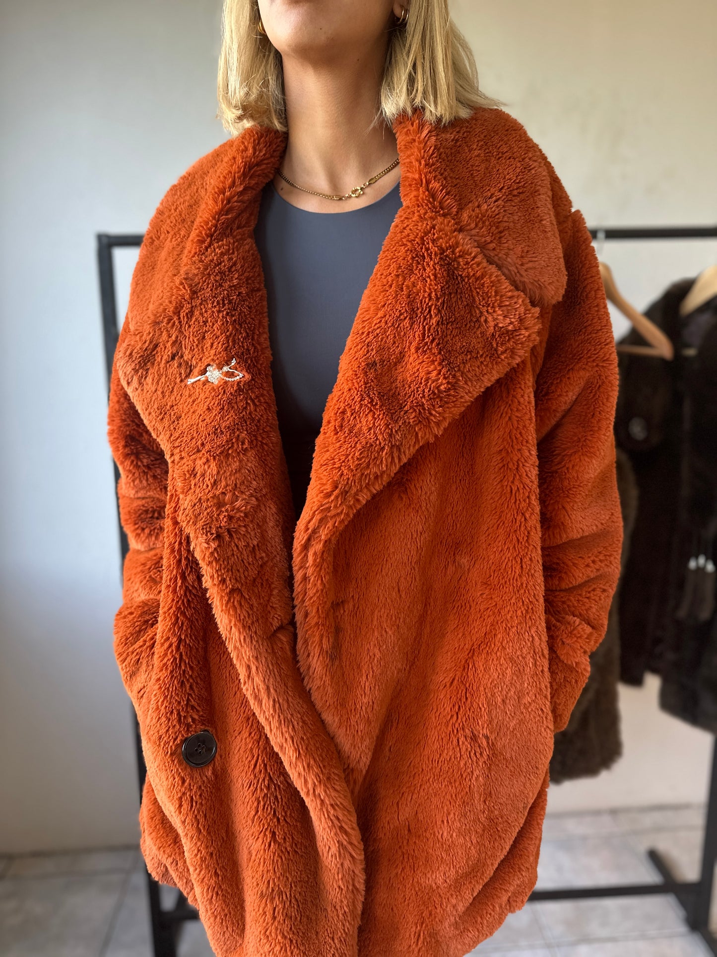 Burns orange fur coat