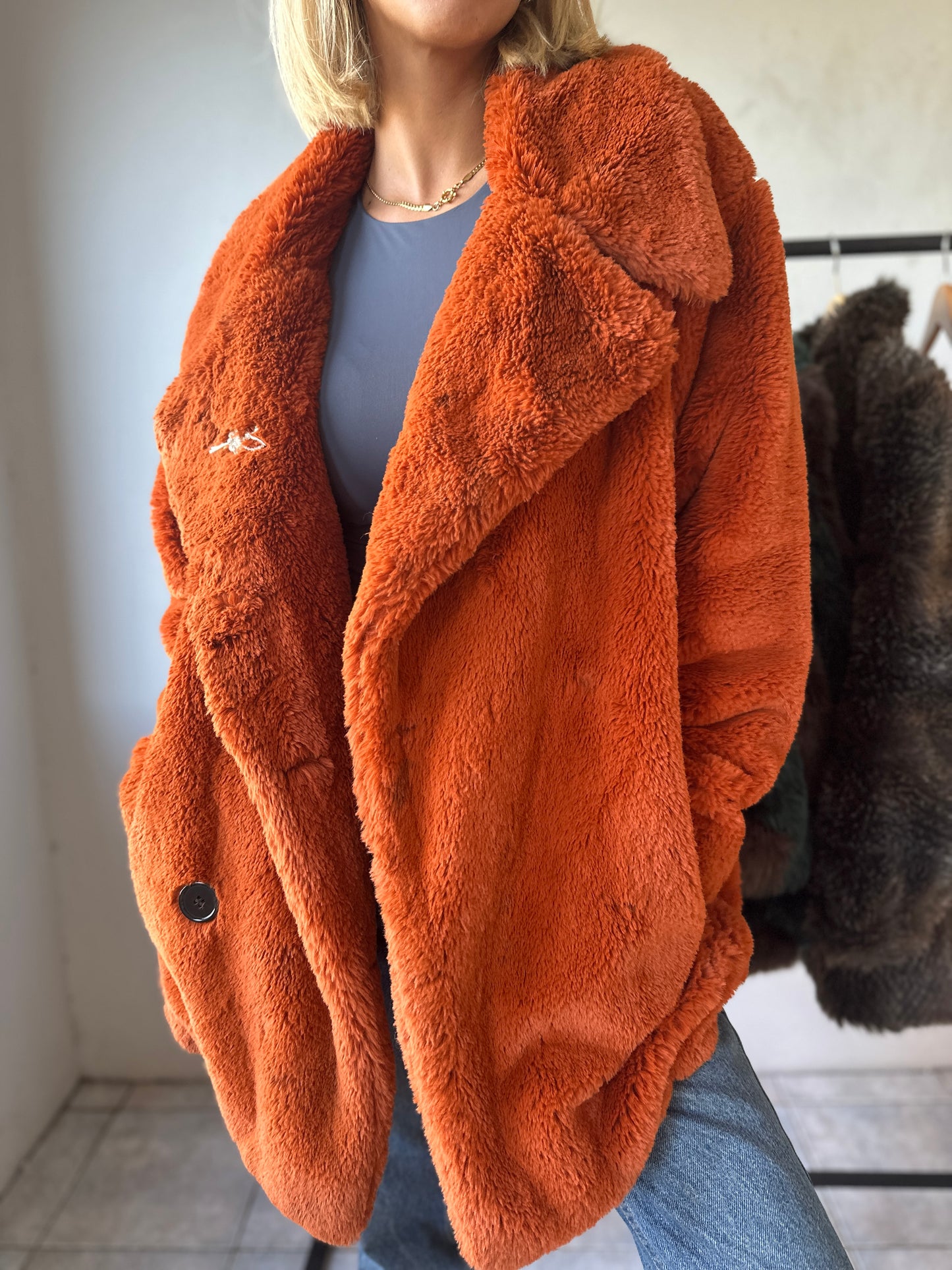 Burns orange fur coat