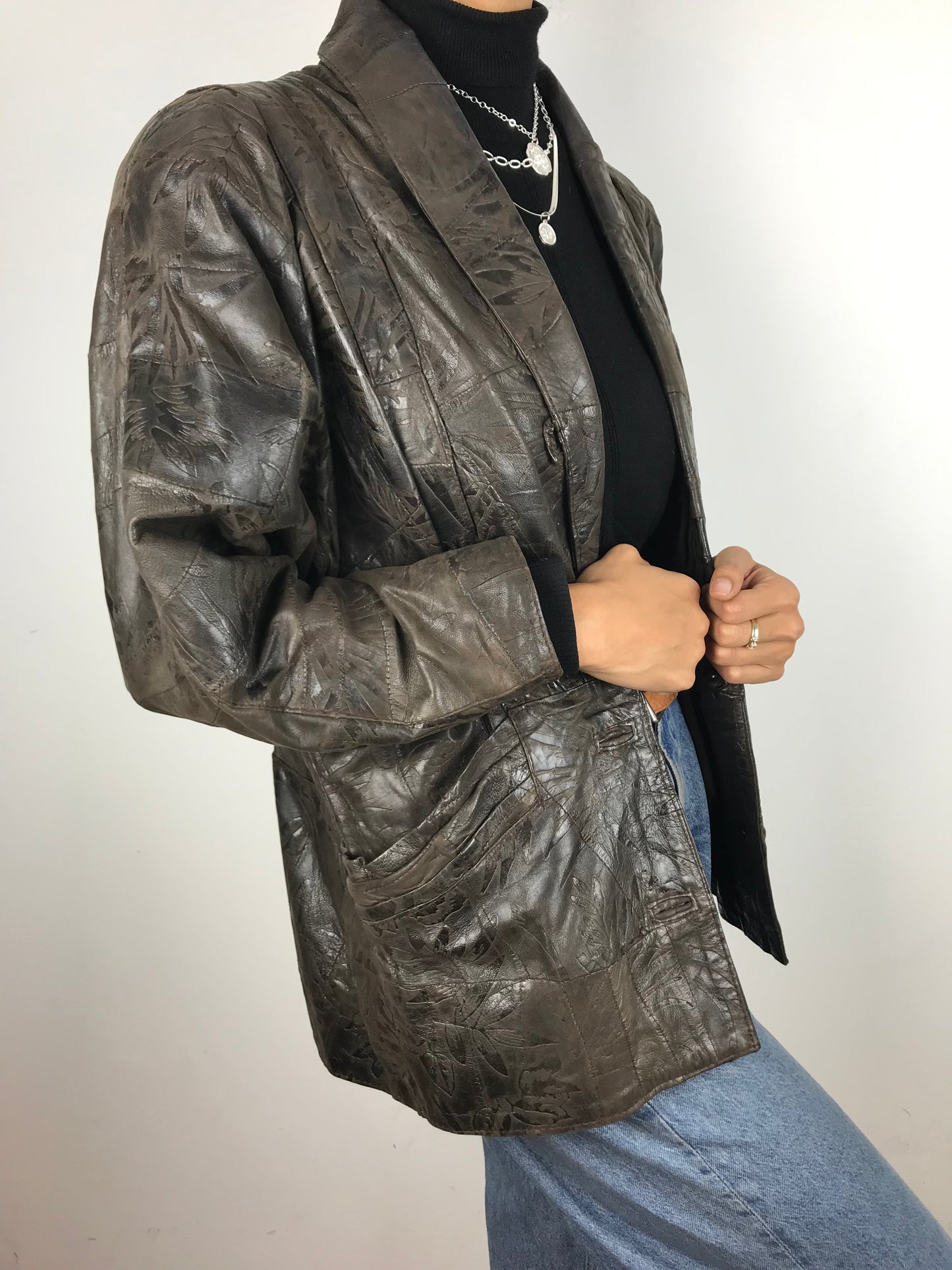 Dark brown embossed leather