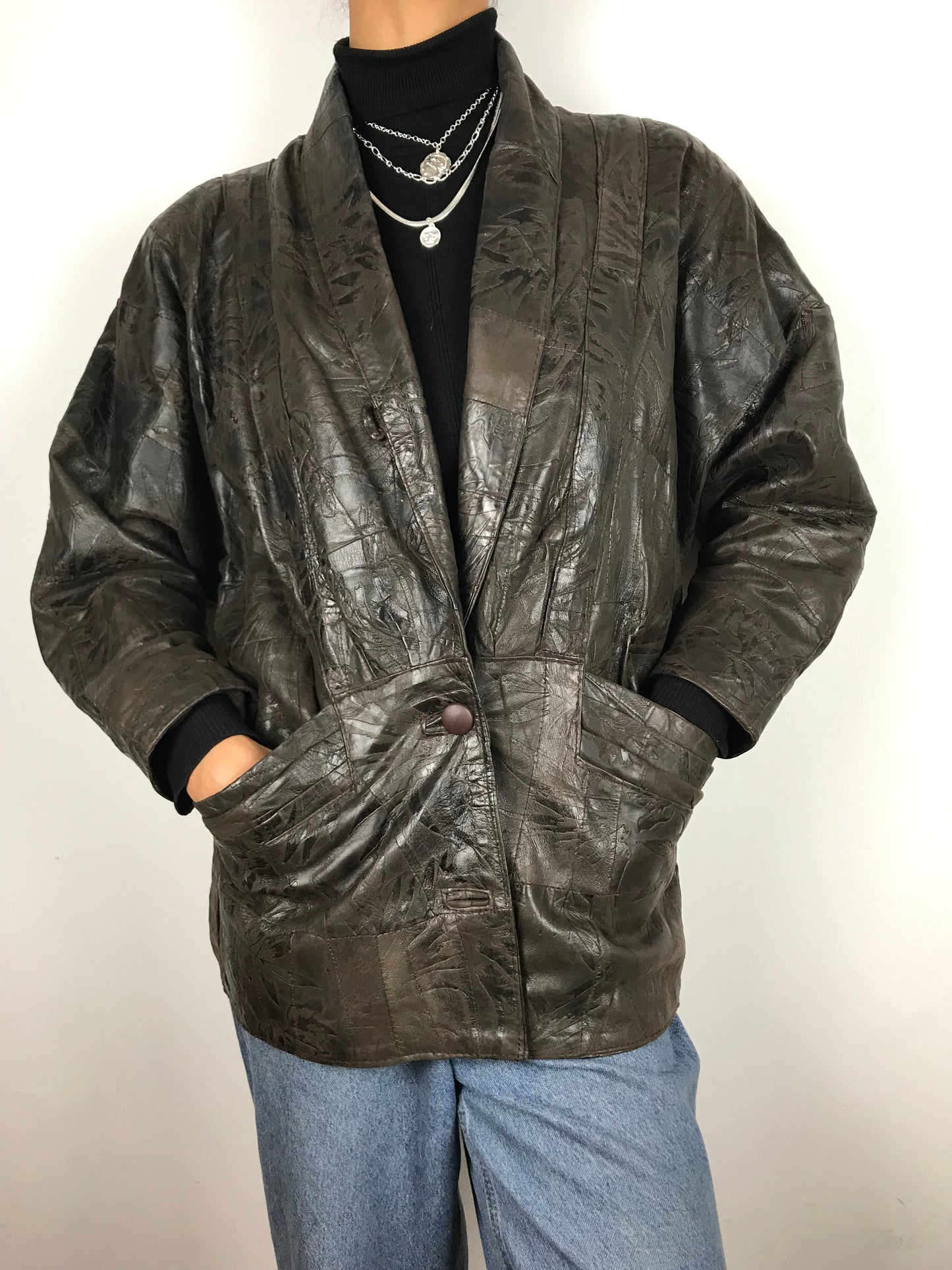 Dark brown embossed leather