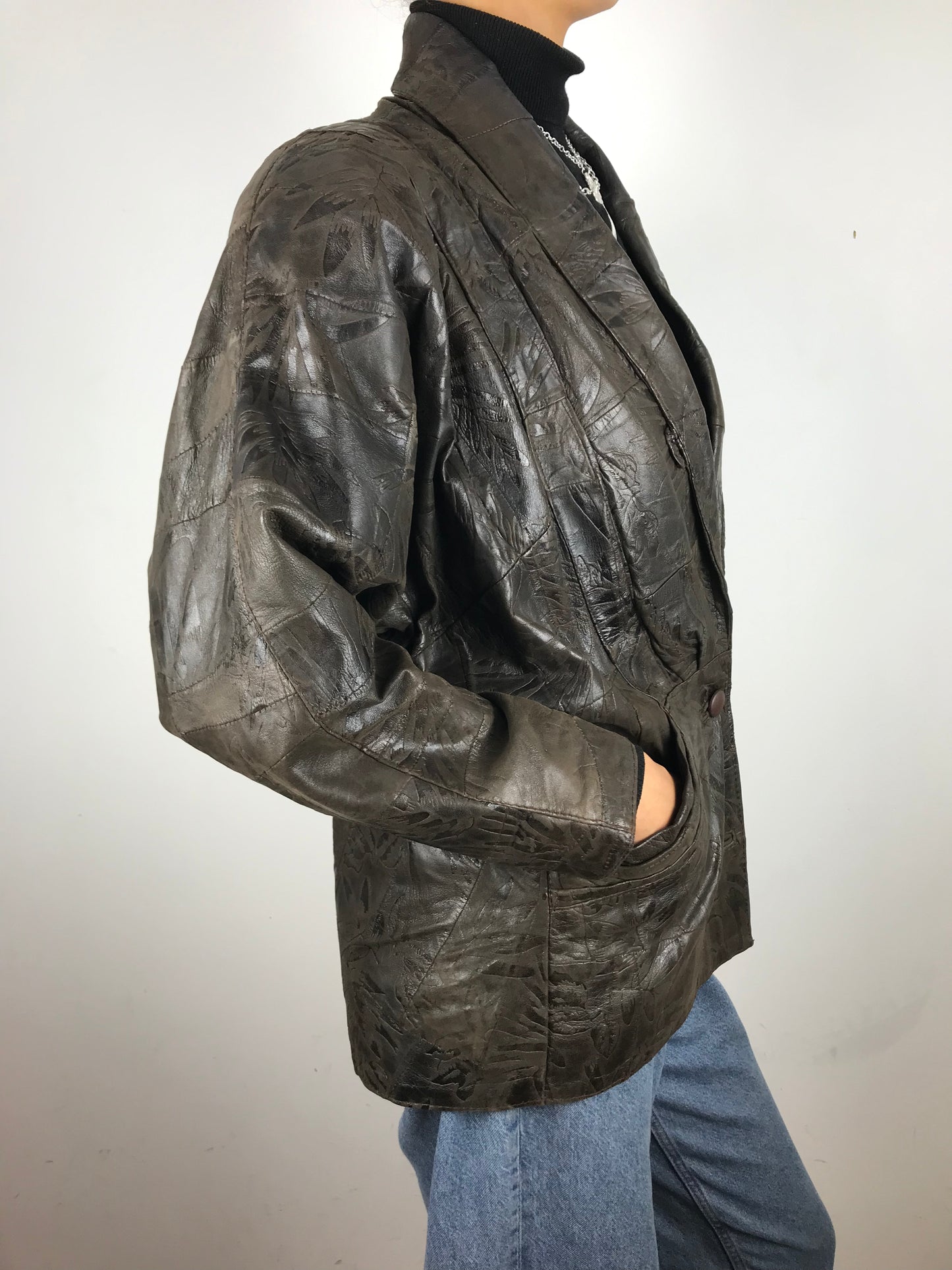 Dark brown embossed leather
