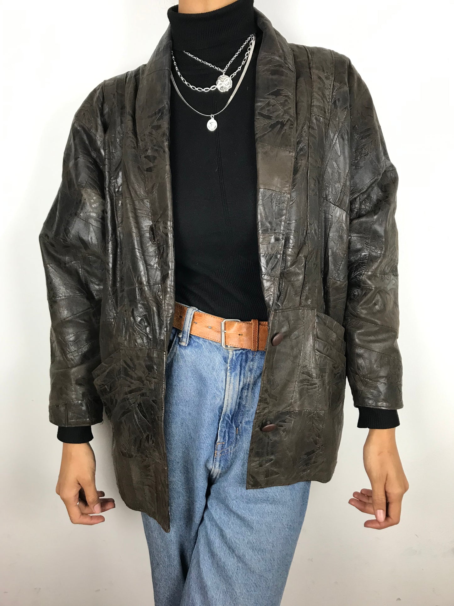 Dark brown embossed leather