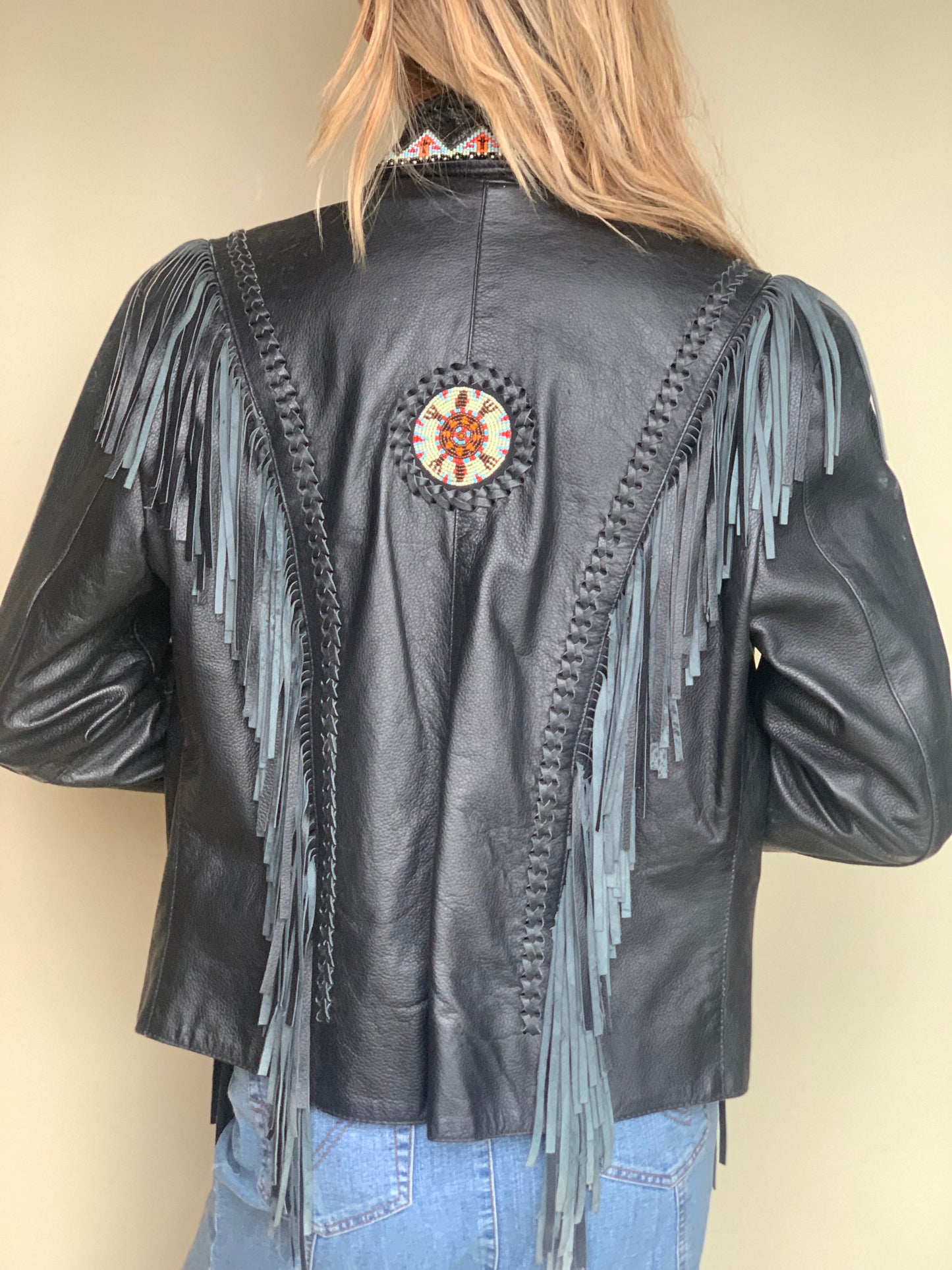 Leather jacket with fringe