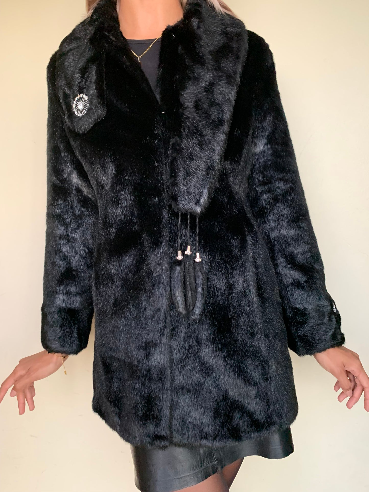 Black faux fur with tassel