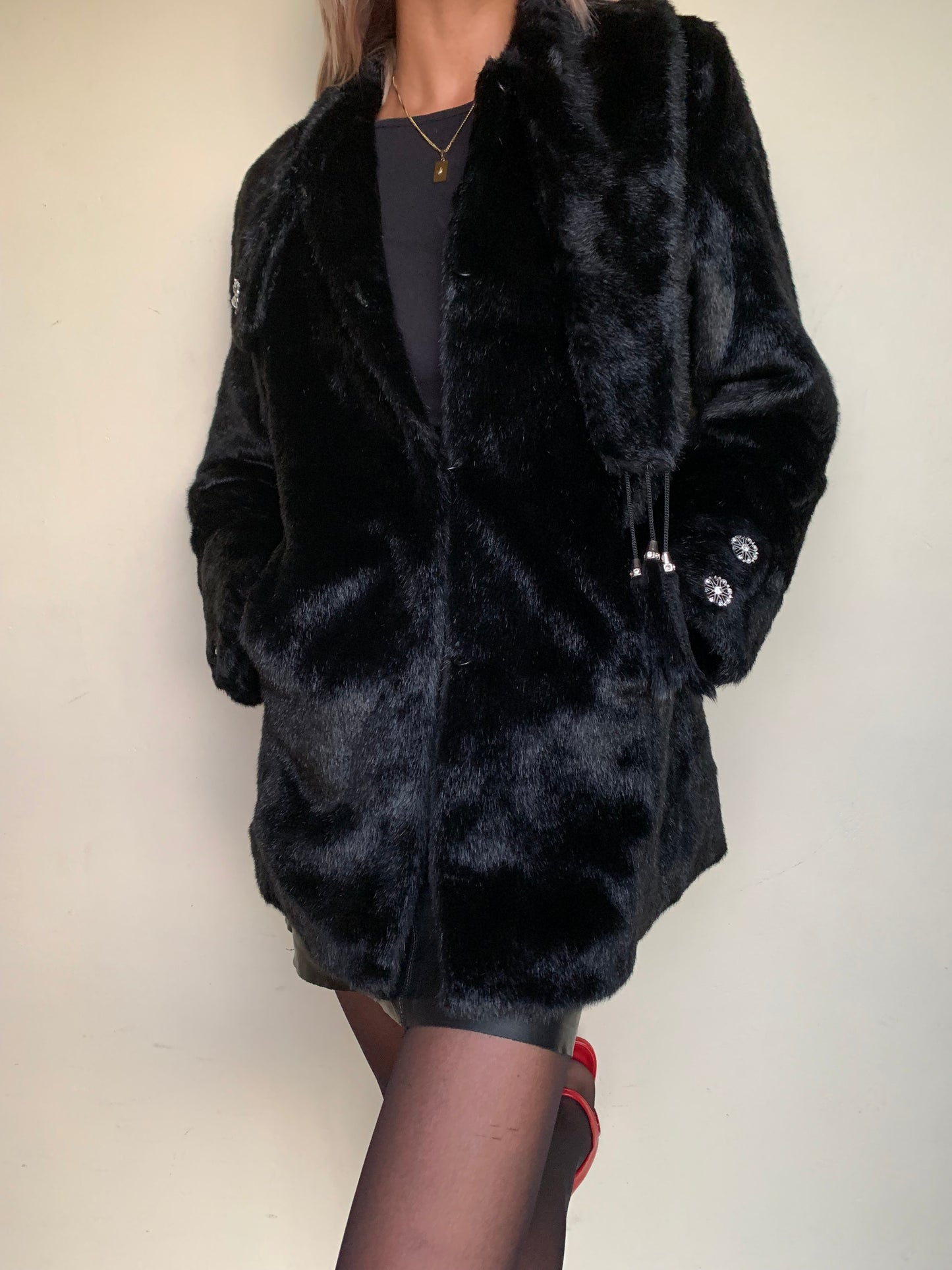 Black faux fur with tassel