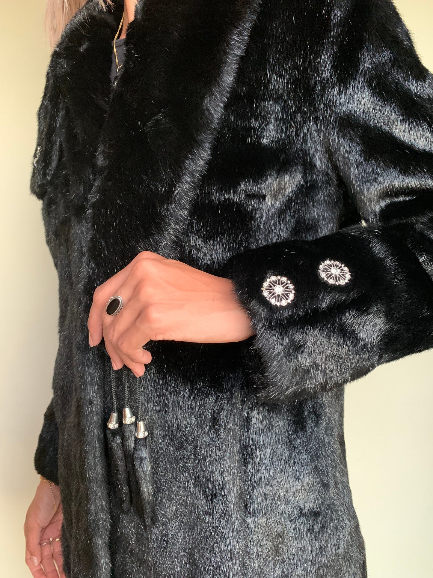 Black faux fur with tassel