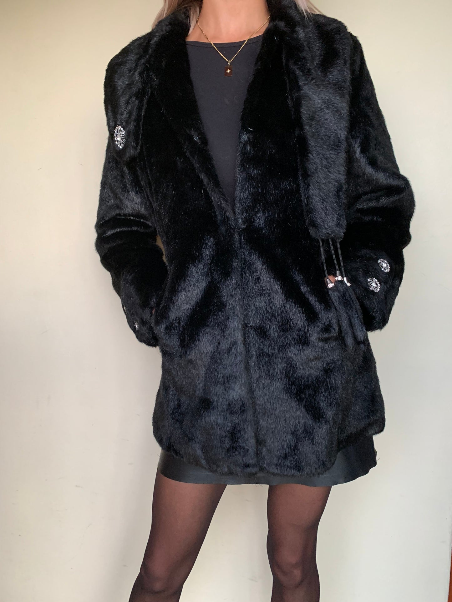 Black faux fur with tassel