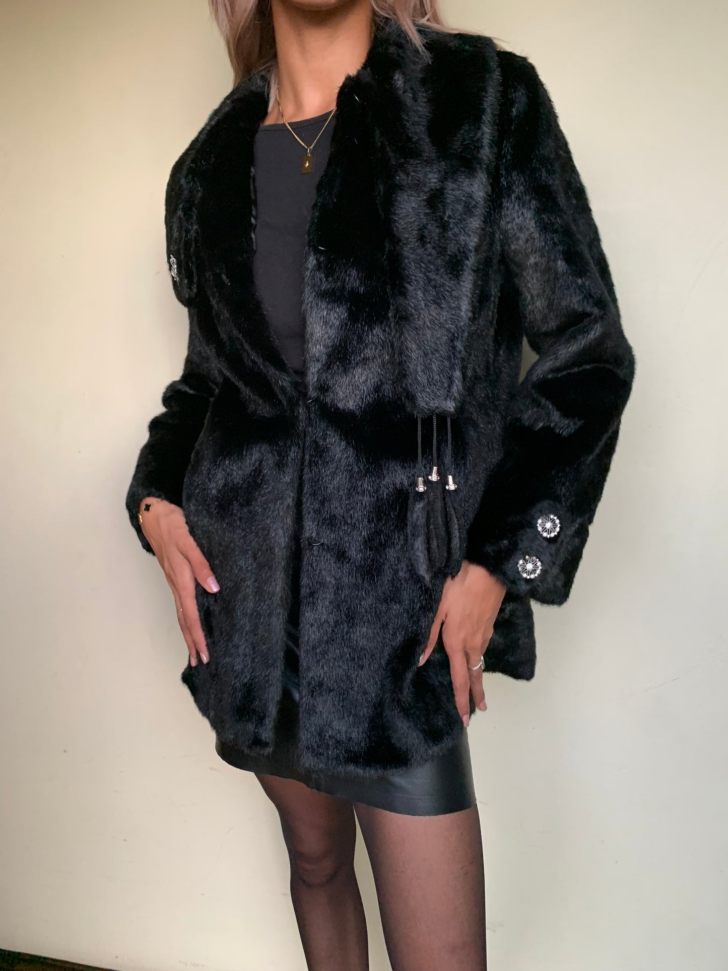 Black faux fur with tassel